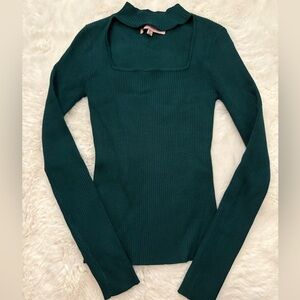 women’s green sweater open neckline